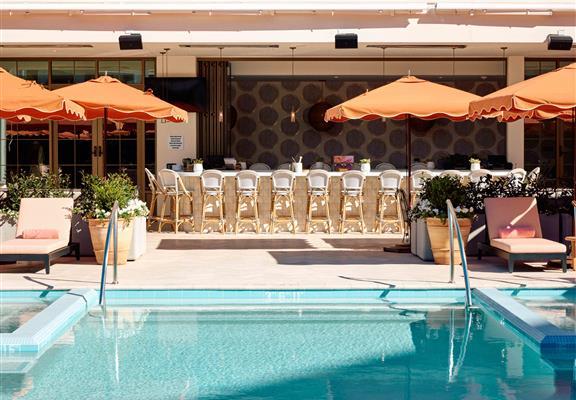 Shimmering pool, with a vibrant design and the best margaritas