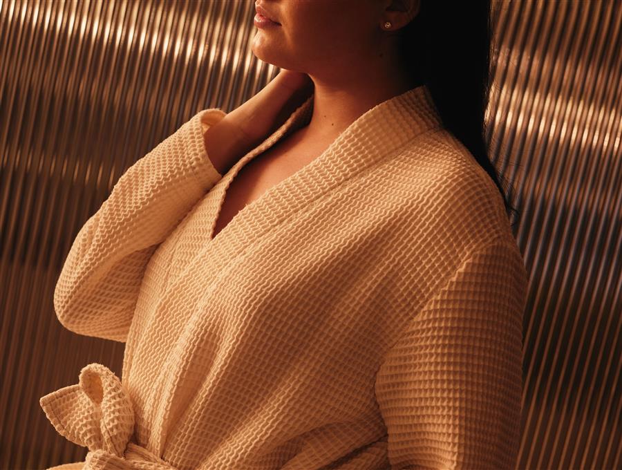 Woman in robe at spa